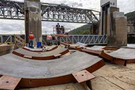 Contractors prepare for repairs to the concrete piers of the Montgomery locks and dam facility on the Ohio River, Pennsylvania, USA