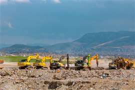 excavators on the rubble landfill area in Malatya after the major earthquakes