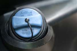 The AdBlue DEF filler cap on a truck. 