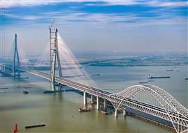 The photo shows the construction site of the Changtai Yangtze River Bridge in Taizhou, Jiangsu province, China, on November 10, 2024. (Photo by Costfoto/NurPhoto)